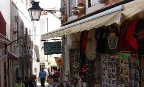 The narrow street and the souvenir shops.
